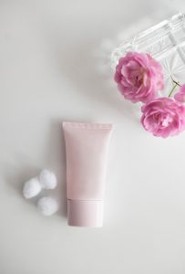 cosmetics with cotton pads.