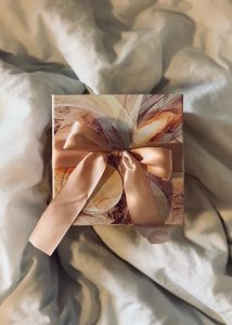 Gift with a ribbon pastel colors