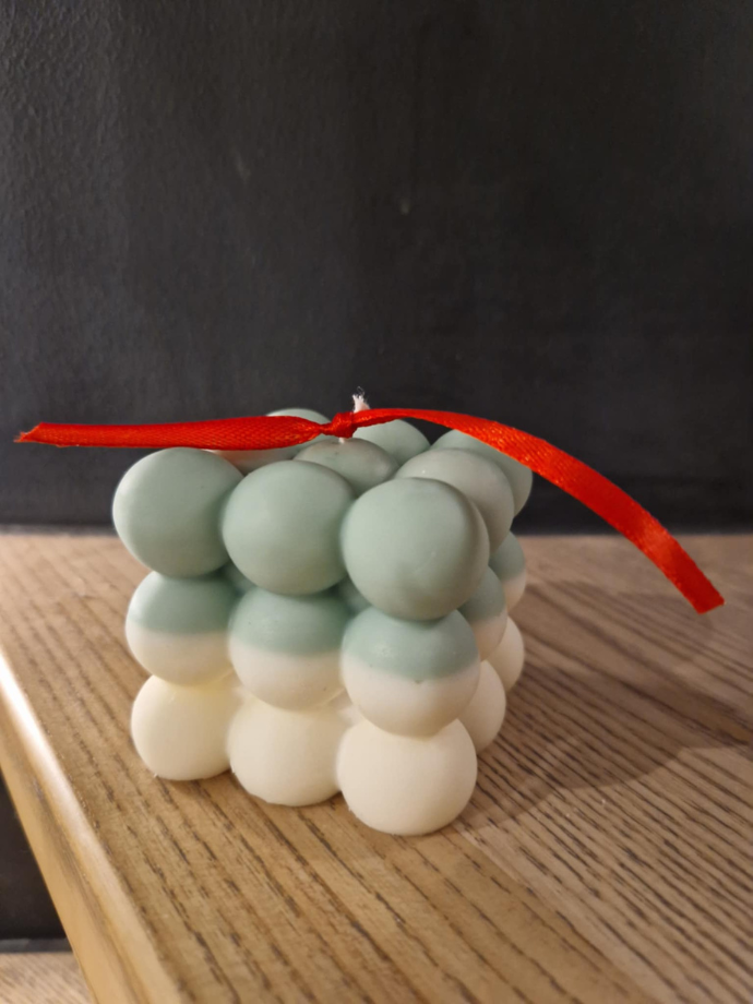 Kalėdinė žvakė, kvepianti karštu vynu